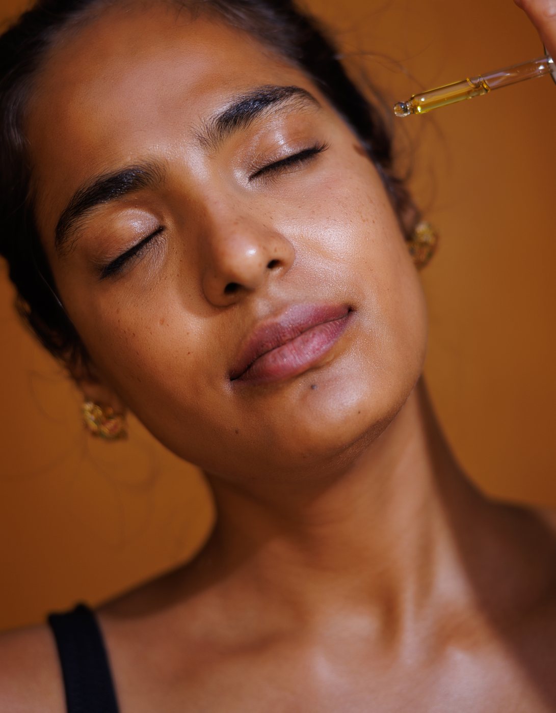 Maulie Rituals beauty campaign — skincare application close-up